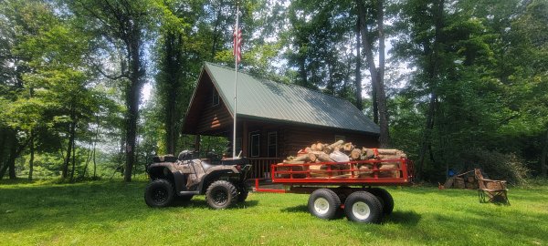 ATV Trailer with firewood at a cabin